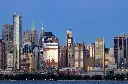 large-skyscrapers-downtown-new-york-sunset.webp